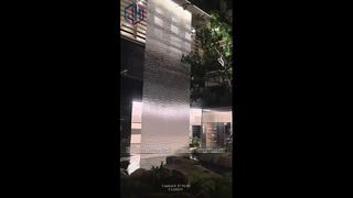 Water curtain in the night glow